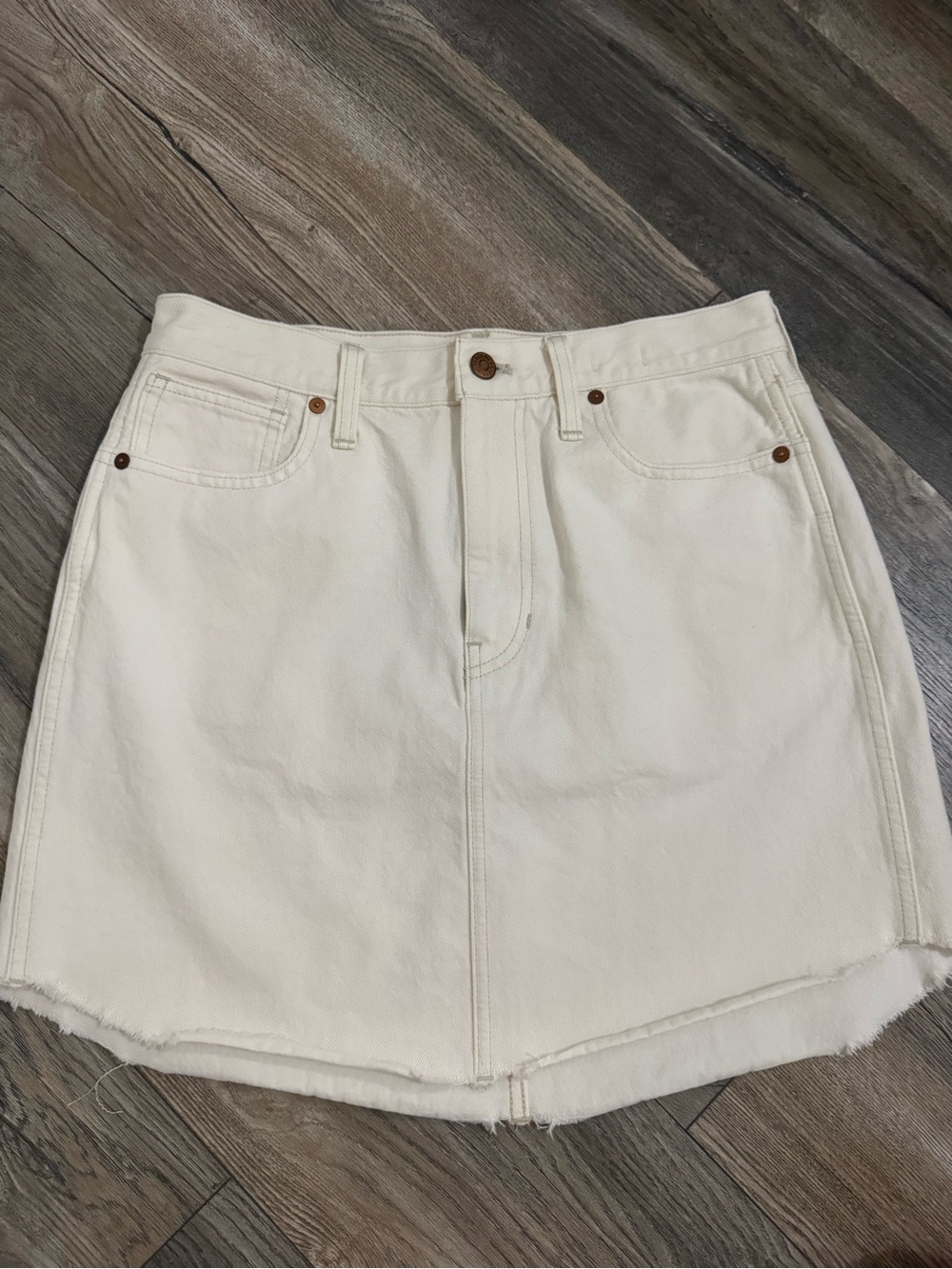Madewell Off-White Denim Mini Skirt - rigid A line raw hem dolphin cut